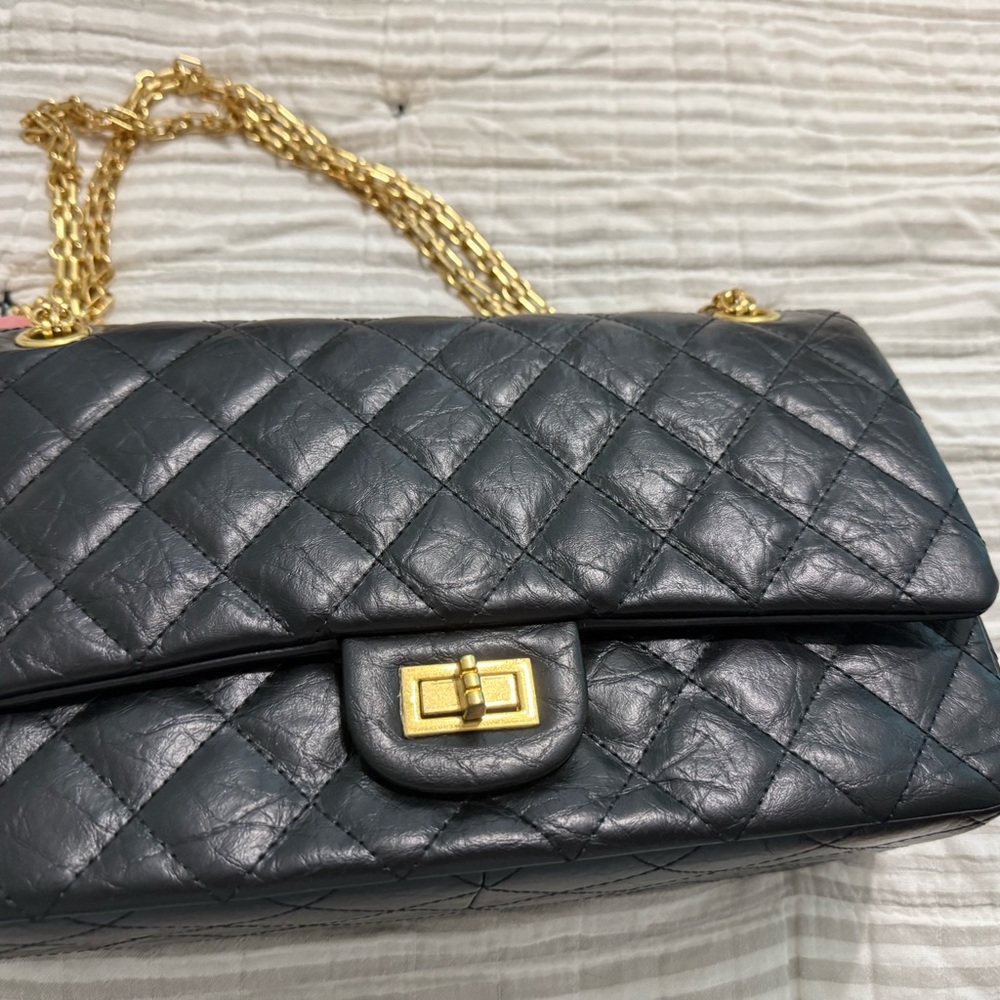 Elegant Black Quilted Leather Bag with Gold Chain